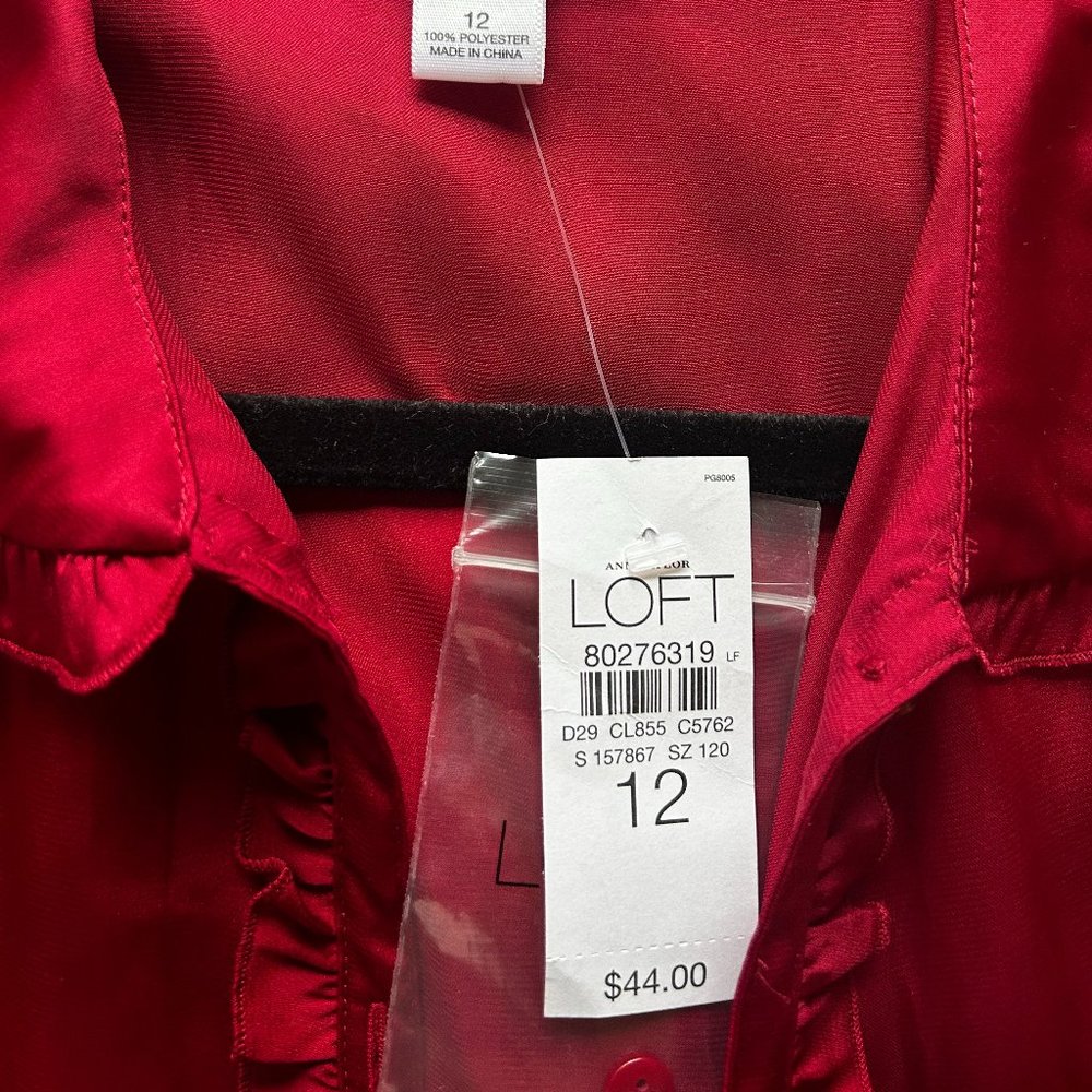 Red blouse. Satin/Silk look.
